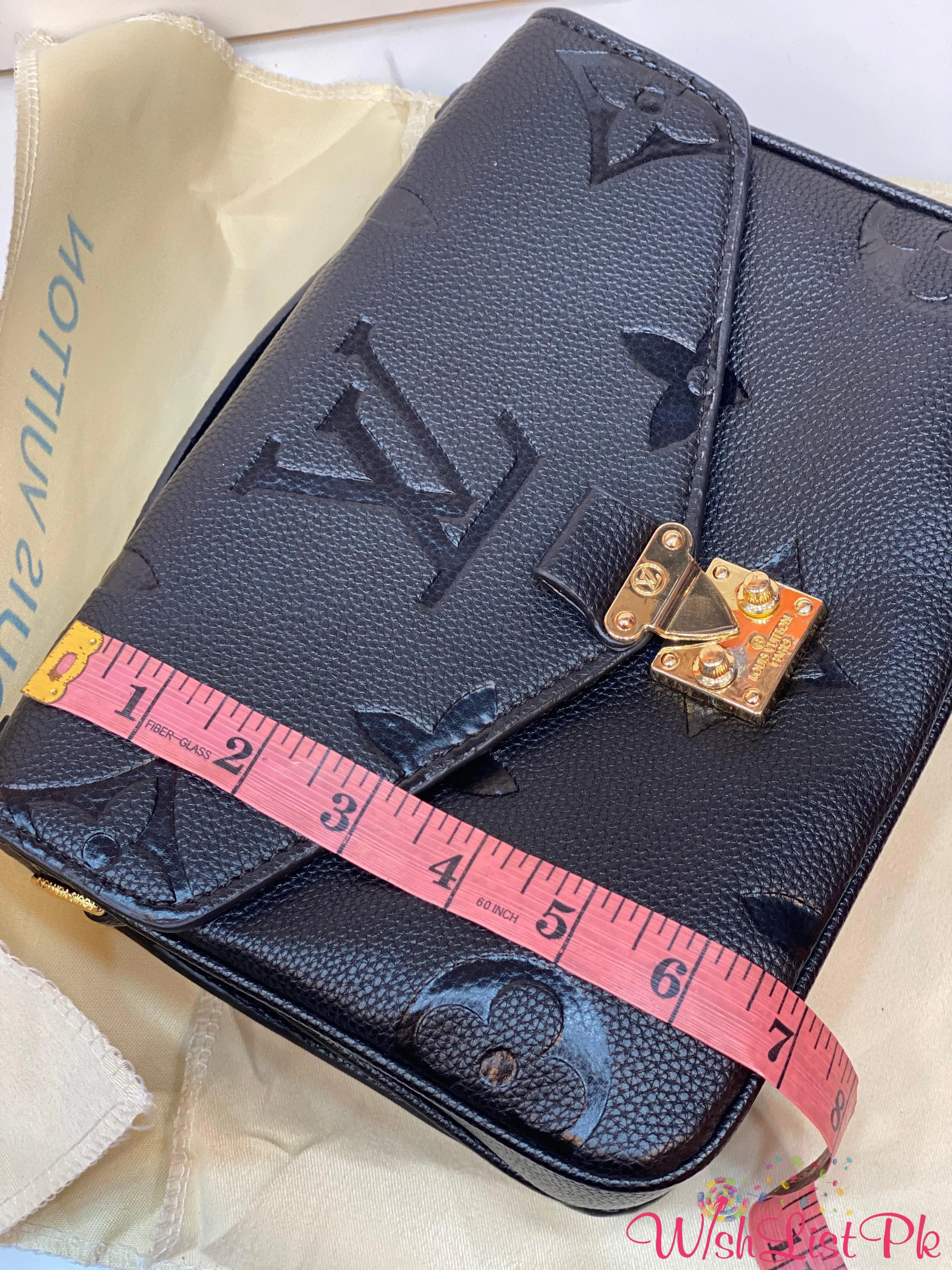 Lv Matallic Monogram Embroidered Pochette Bag.