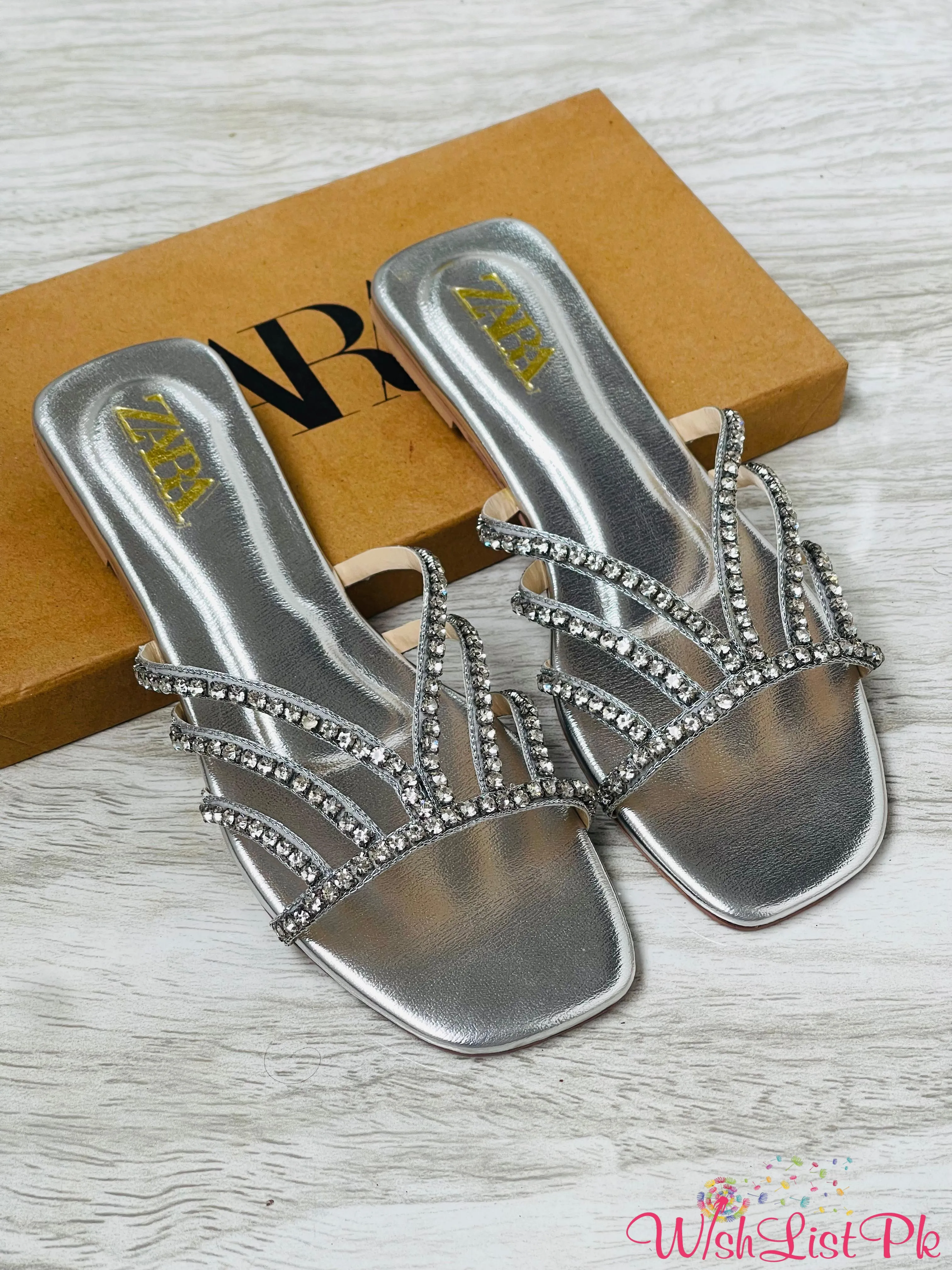 Zara Slides 